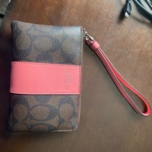 Coach wristlet got 2 yrs ago used but good condition no rips or tears